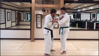 Jodan Uke used with a beginner clinch/grappling type setup.