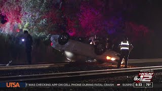 SAPD: Driver rolls vehicle, narrowly avoids being hit by train