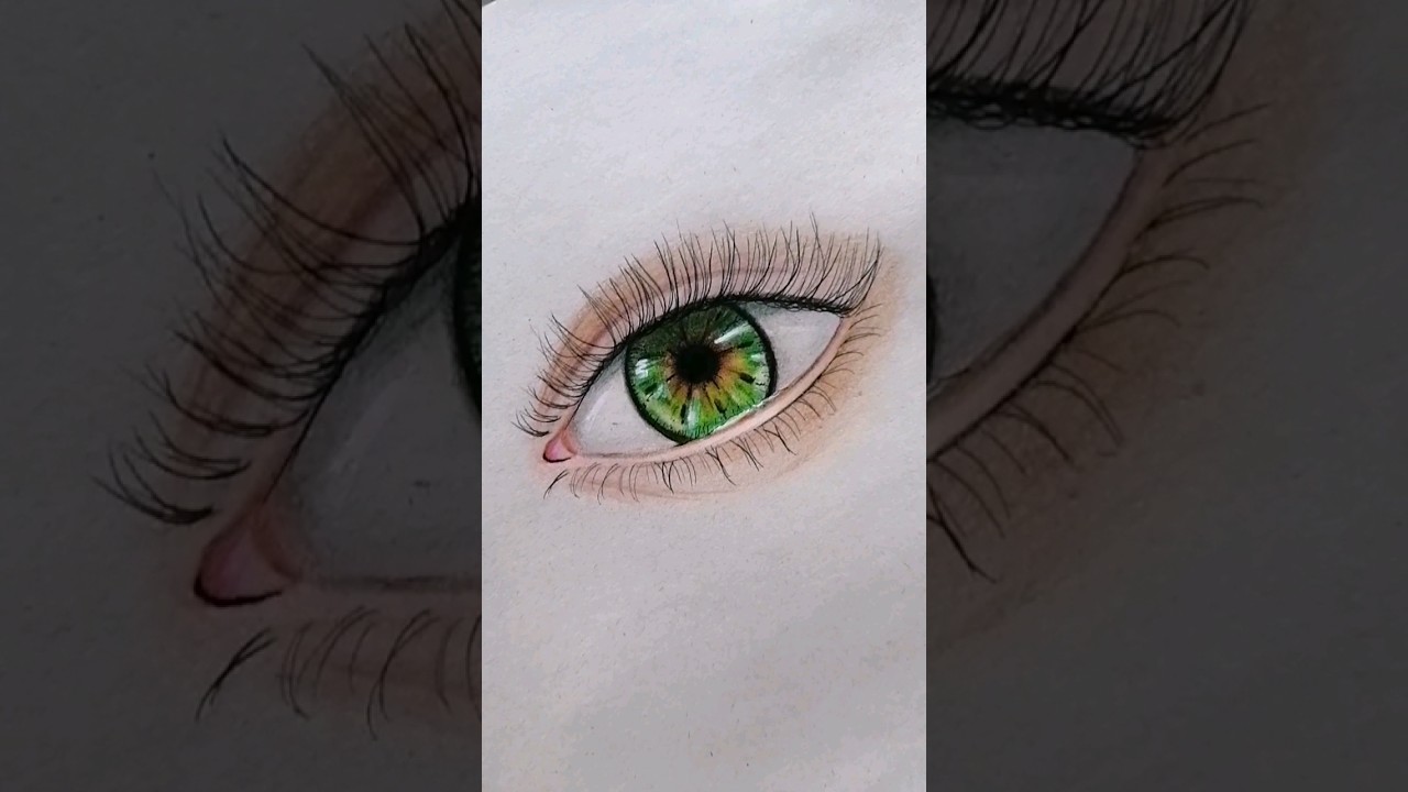 Dibujo ojo con lápices de colores.  