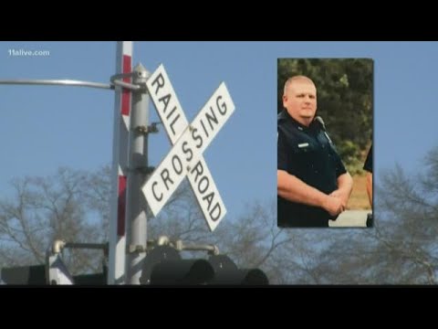 Officer recovering after getting hit by train during foot chase - YouTube