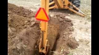 Case 530 backhoe operated by a friend