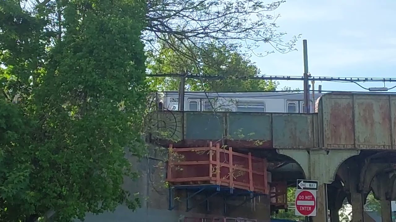 Manhattan bound R142 5 local train at Baychester Avenue in new york city transit station at MTA