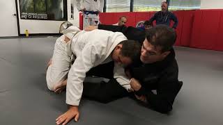 Back takes and rolling arm bars (outside hook sweep setup)