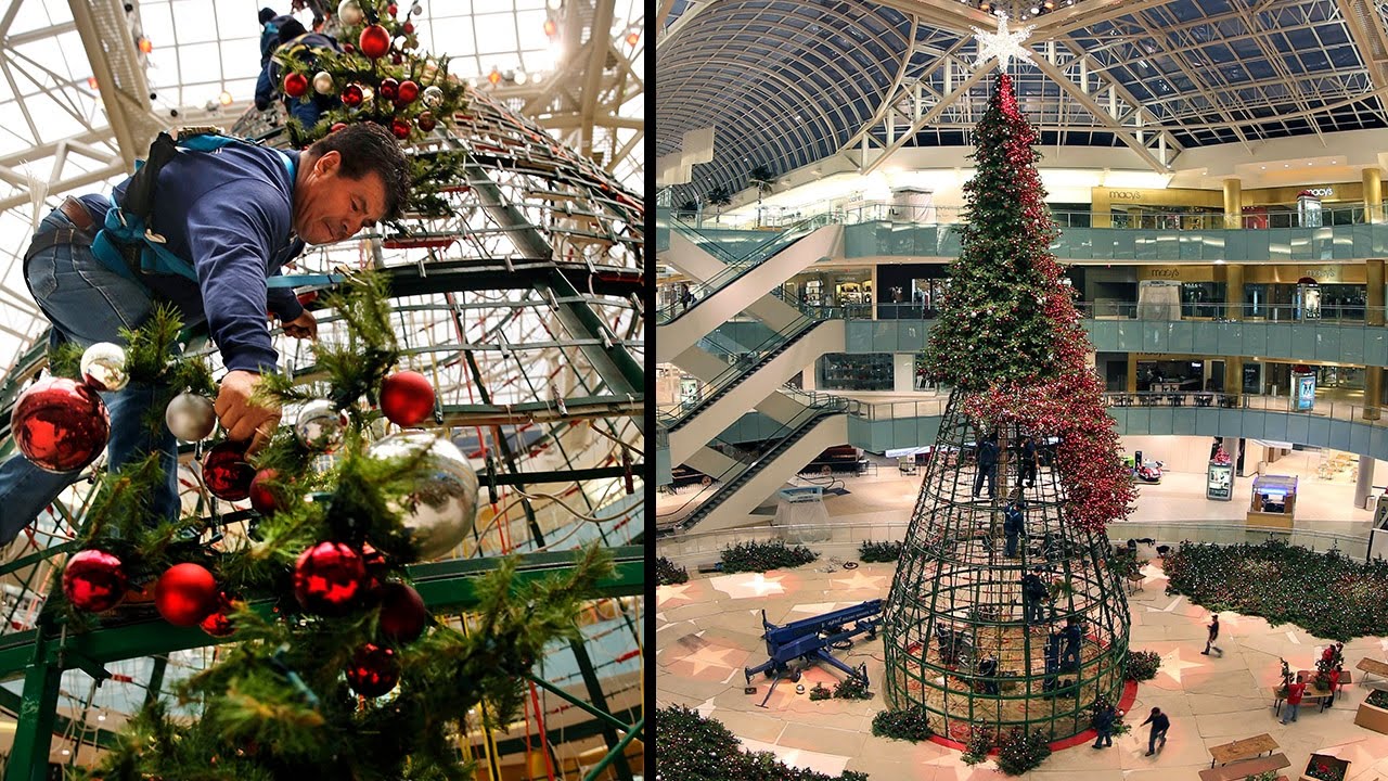 Time lapse Galleria Dallas  Christmas  tree is raised and 