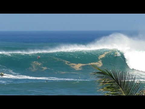Eddie Aikau event . Unique crowd perspective of surfing Waimea Bay.