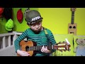  look  incredible 8yearold boy sean ukulele playing while my guitar gently weeps