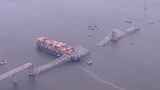 Recovery efforts suspended at collapsed bridge in Baltimore after two bodies found