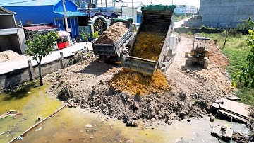 The Project​ Using bulldozer ​ MITSUBISHI BD2f Dozer Pushing stone Into the deep water