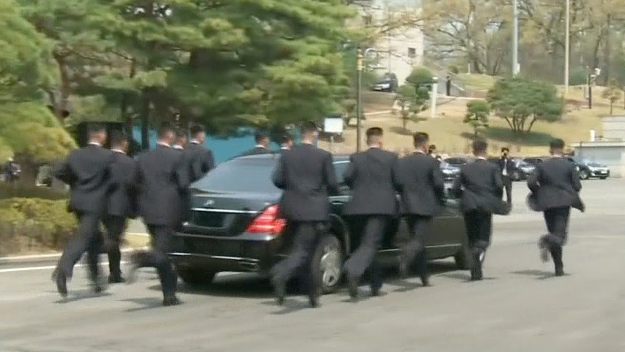 Watch Kim Jong Uns Security Guards Running Beside His Car YouTube