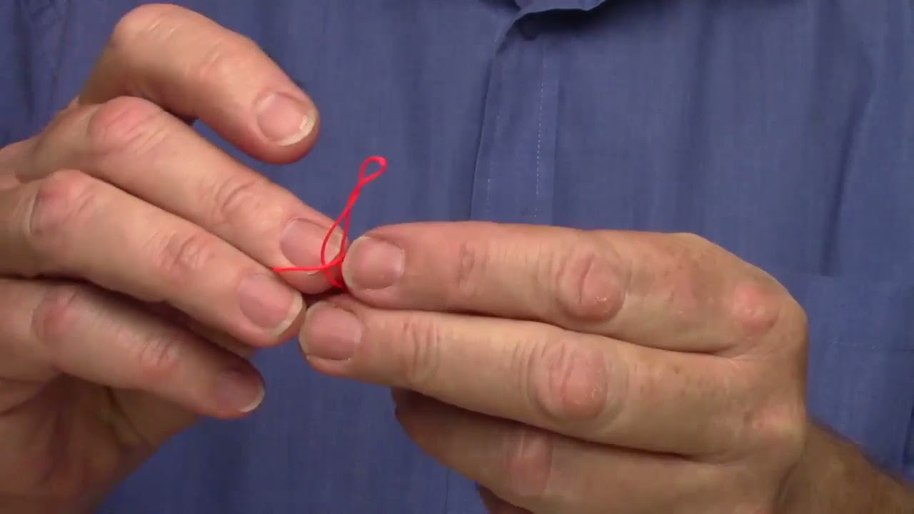 Forming the parasol (prior to tying a parasol emerger)