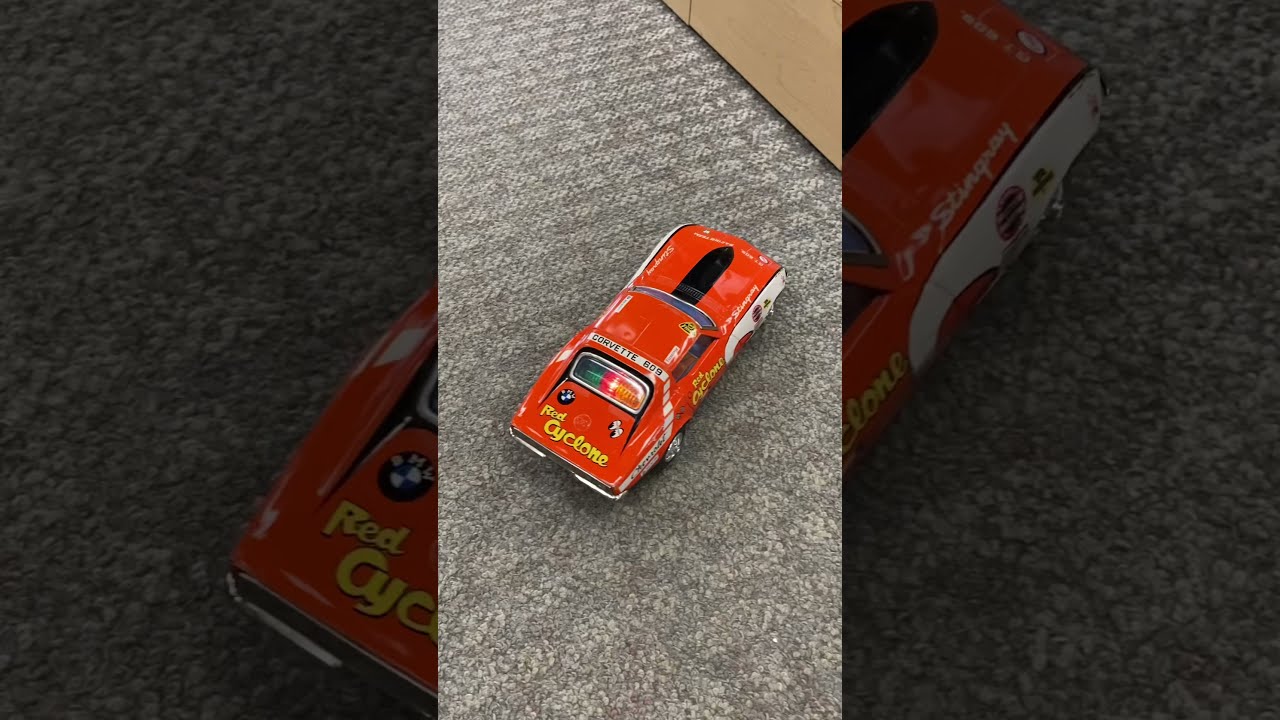 Rusher Stingray Corvette Bump N Go Battery Operated Tin Toy