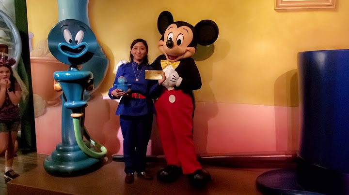 I introduce inflated blueberry Violet Beauregarde plush doll and Wonka Golden Ticket to Mickey Mouse