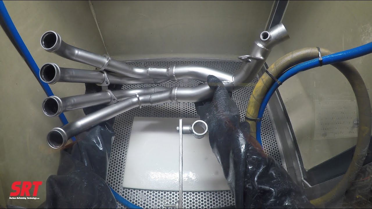 Cleaning a Motorcycle Exhaust Header by Vapor Honing Surface