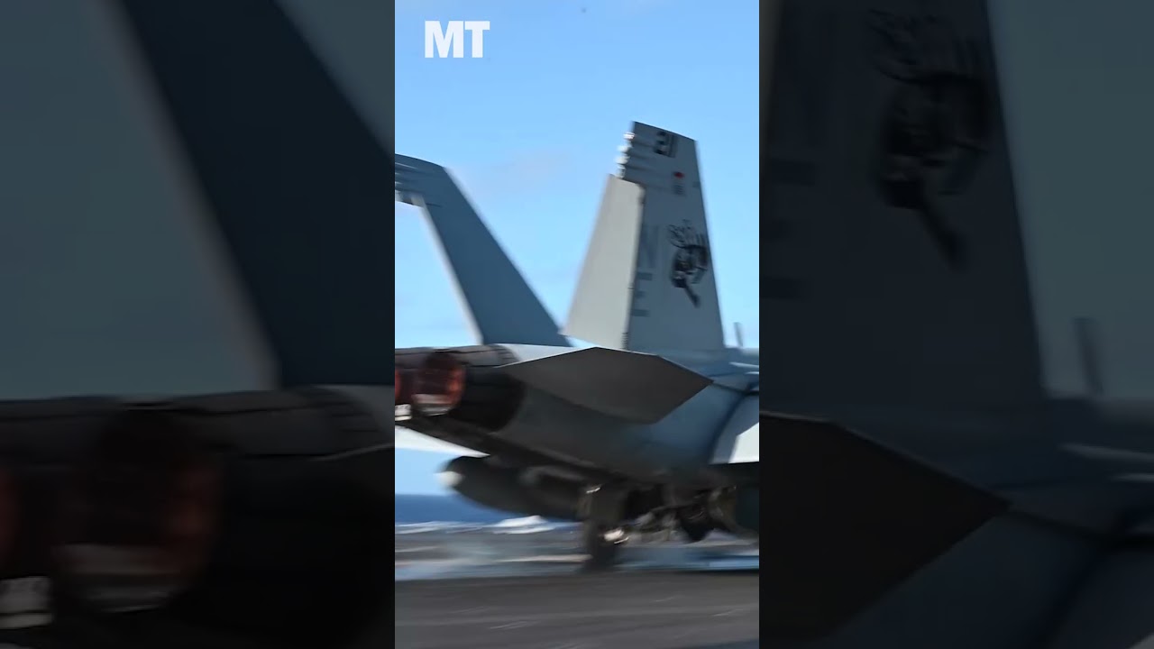 Step aboard the aircraft carrier Carl Vinson for launch and recovery operations