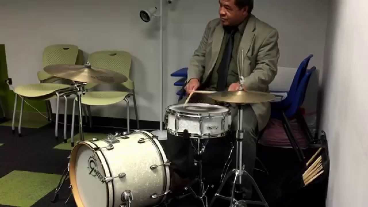 Ernie Adams explains the history of NOLA drumming.