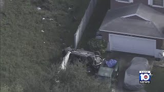 Mail theft suspects flip car, crash through wall after fleeing officers, police say