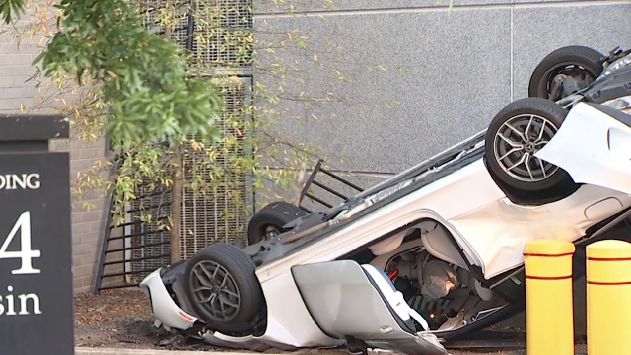 Car falls from parking garage and lands upside down in Montgomery ...