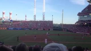 Carlos Santana throws out Joey Votto