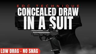 How I Draw a Concealed Pistol in a Suit | Knuckle Roll Technique
