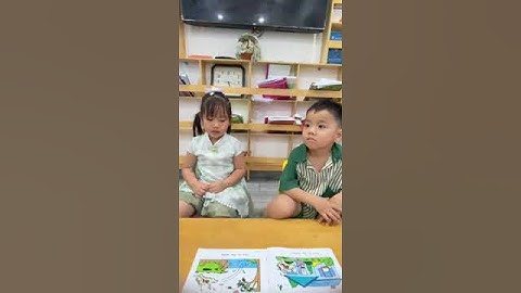 Tiếng Anh Giao Tiếp Thiếu Nhi Tại Phan Thiết: Dolphin and Diana practice talking about read a book