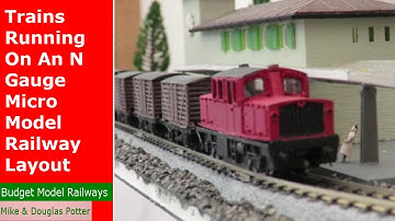 N Gauge Trains Running On A Model Railway