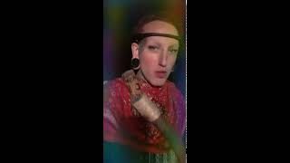 techn0shaman wearing Muse EEG device with sacred magical staph listening to dark psytrance