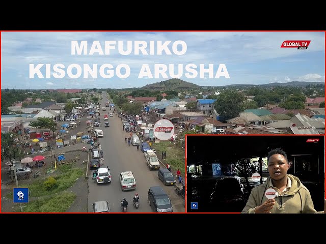 FAMILIA IKIWA KWENYE GARI YASOMBWA na MAJI BABA APAMBANA KUWANUSURU - MAFURIKO ya KUTISHA ARUSHA... class=