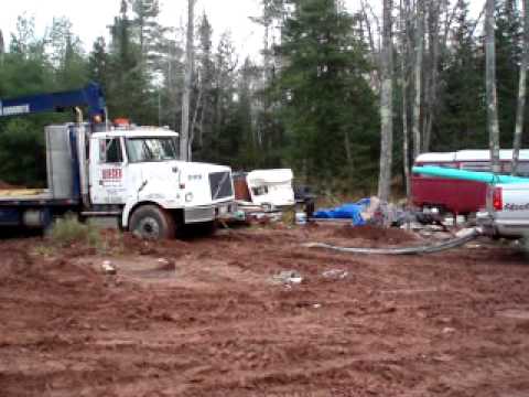 big block 454 pulls semi out of mud - YouTube