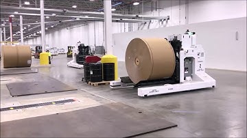 AGV LGV delivering rolls to Harmax tracks