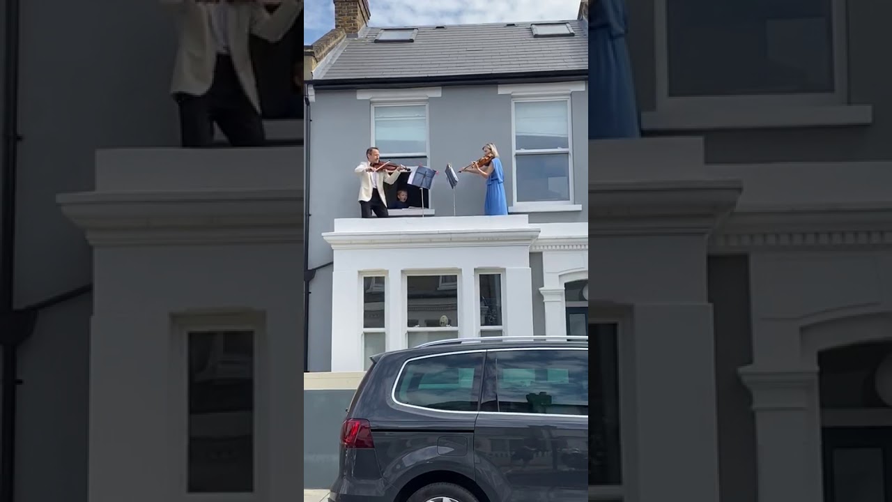 NHS doc and husband serenade neighbors