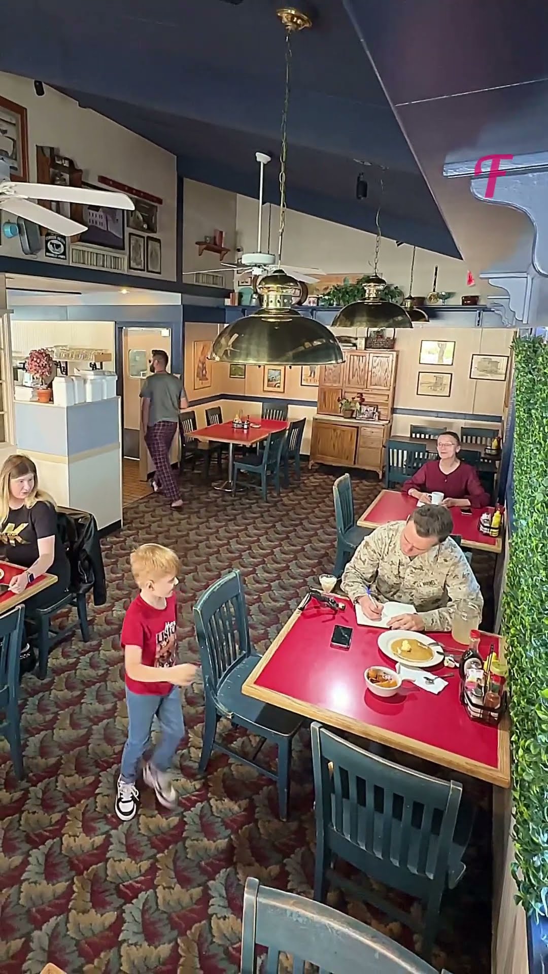 A Heartwarming Moment as a Young Boy Salutes a Marine in a Restaurant #Shorts