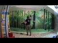 Forest mural painted on the wall.