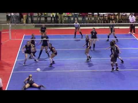 This amazing play is from the 2009 Alabama 6A High School Volleyball Tournament game between Homewood High School (near court) and Murphy High School (far co...