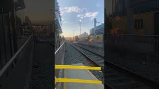BNSF 6873 West has a stack train in tow coming into Everett, Washington on the Scenic Sub