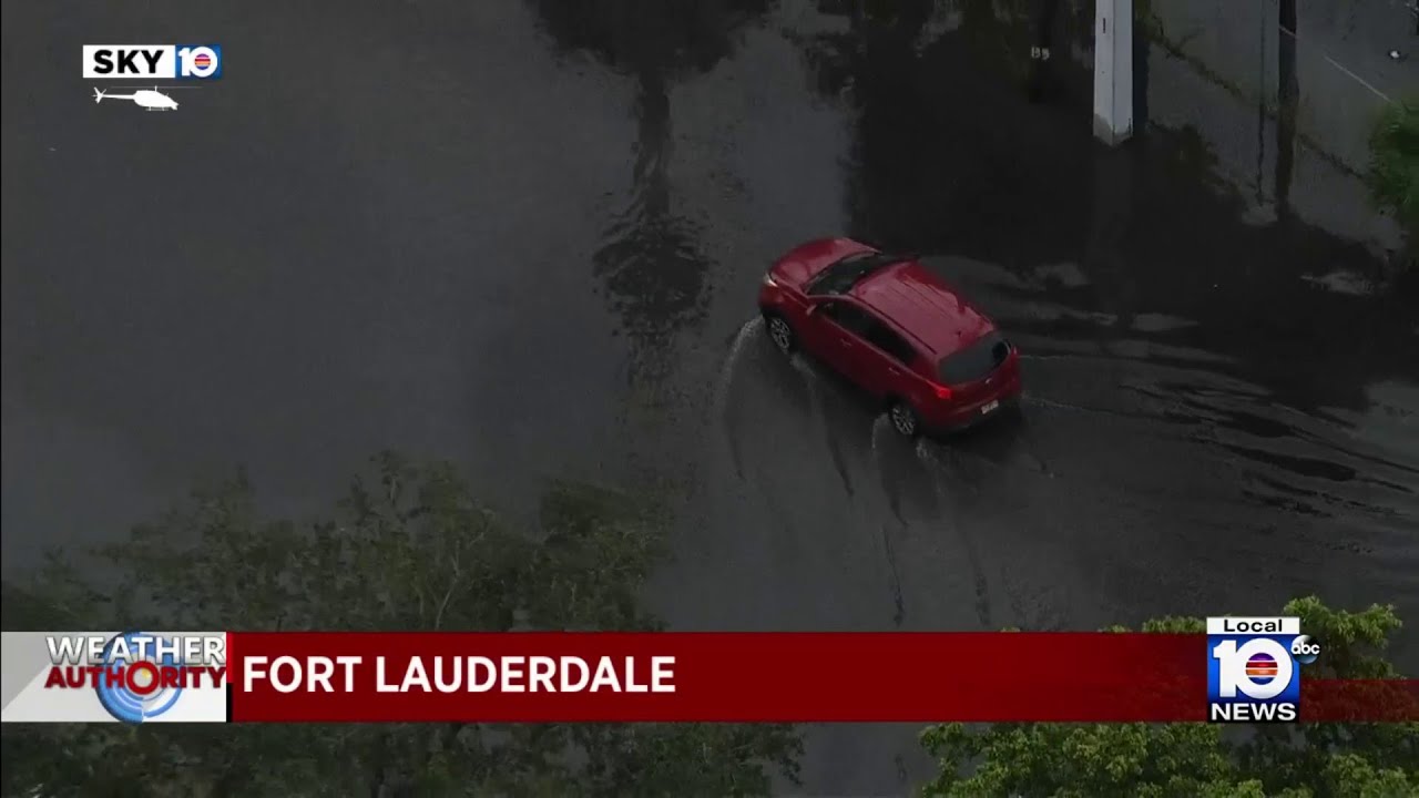 Rain floods some streets in South Florida - YouTube