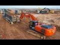 BIG Excavator Soils Into Dump Truck Removing Heavy Machinery Loading