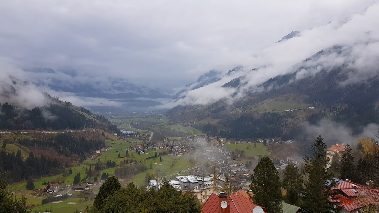 Time lapse view of fog and skies over mountains Austria Bad Gastein