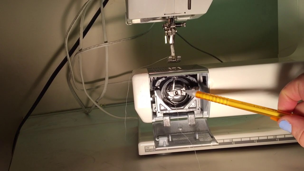 Putting the bobbin into a Bernina sewing machine. - YouTube