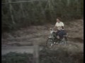 Girl riding her moped offroad