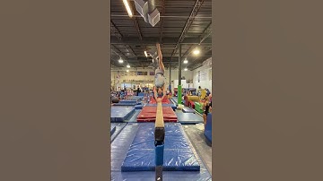 Back-handspring layout step-out from back angle