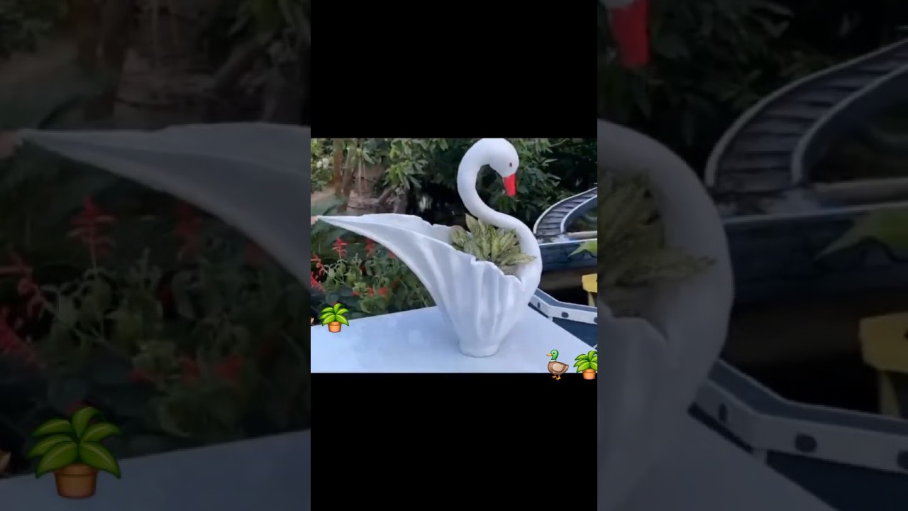 adorable duck-shaped cement flower pot made from old clothes! 🦆🪴
