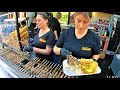 Street Food Fest in Italy. Grilled Meat, Burgers, Angus, Smoked Pork, Sausages, Octopus