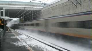 Eurostar Class 373 passing Stratford International with kick back of Snow