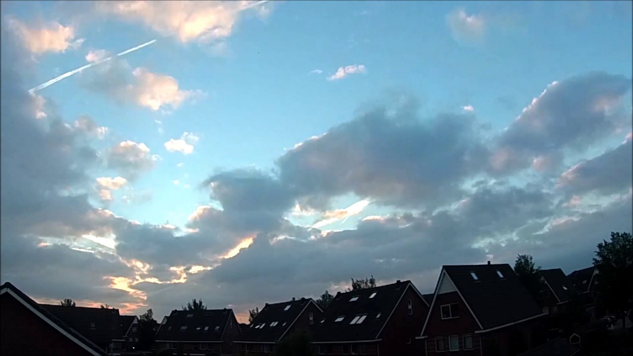 zon op zon onder en lokaal onweer - YouTube