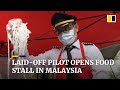 Malaysian pilot opens food stall after being laid off amid Covid-19 pandemic