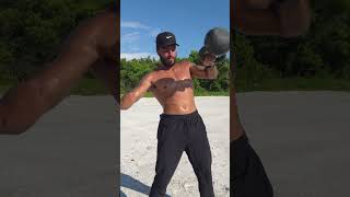 60 lb/ 27 kg kettlebell snatch on the beach. -#outdoorworkout #kettlebellworkout  #fitness #trainer