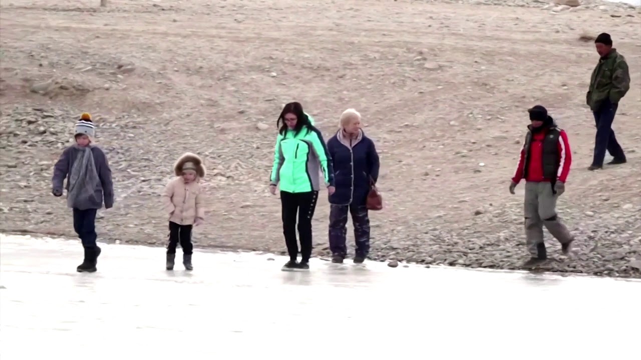 Frozen Kyrgyzstan lake becomes sledding arena
