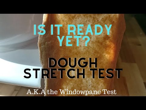 Performing a Windowpane Stretch Test on Bread Dough How to Tell If It's Properly Kneaded
