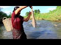 survival in the rainforest - woman cooking shark  with banana tree  - Eating delicious