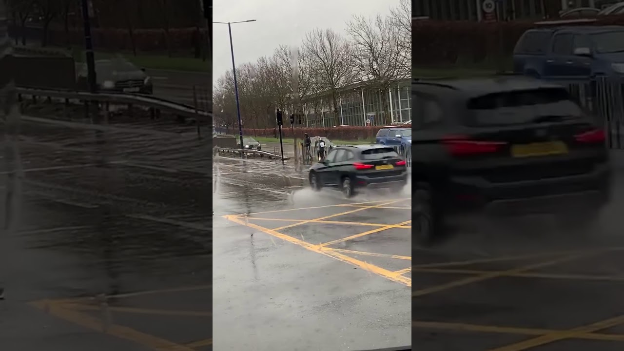 People getting absolutely splashed by big puddles!